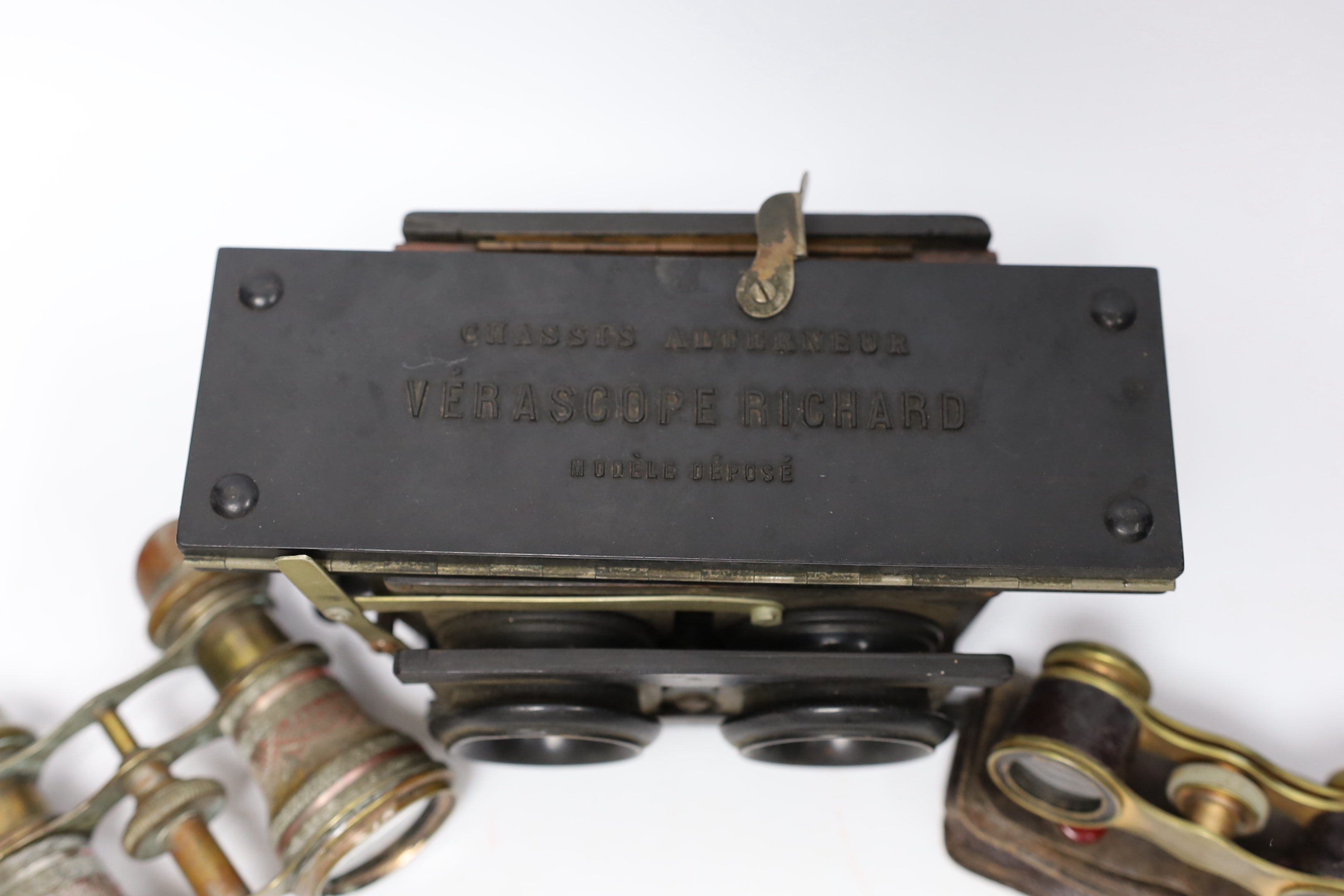 A Stereoscope viewer, a Verascope holder and two pairs of opera glasses